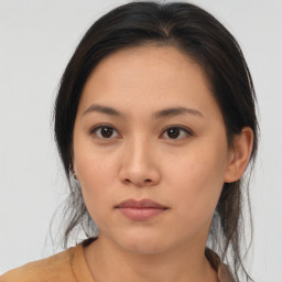 Neutral asian young-adult female with medium  brown hair and brown eyes