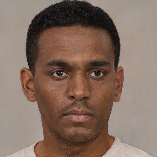 Neutral black young-adult male with short  black hair and brown eyes