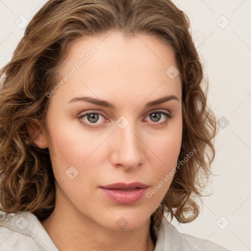 Neutral white young-adult female with medium  brown hair and green eyes