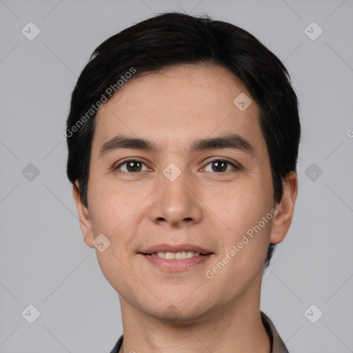 Joyful white young-adult male with short  black hair and brown eyes