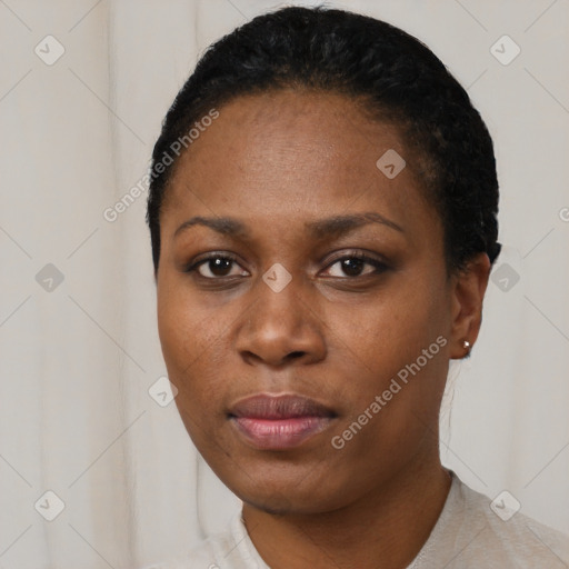 Neutral black young-adult female with short  black hair and brown eyes