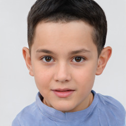 Joyful white child male with short  brown hair and brown eyes