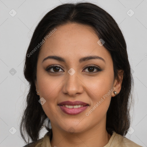 Joyful latino young-adult female with medium  brown hair and brown eyes