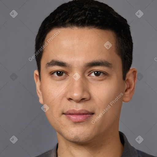 Joyful white young-adult male with short  black hair and brown eyes