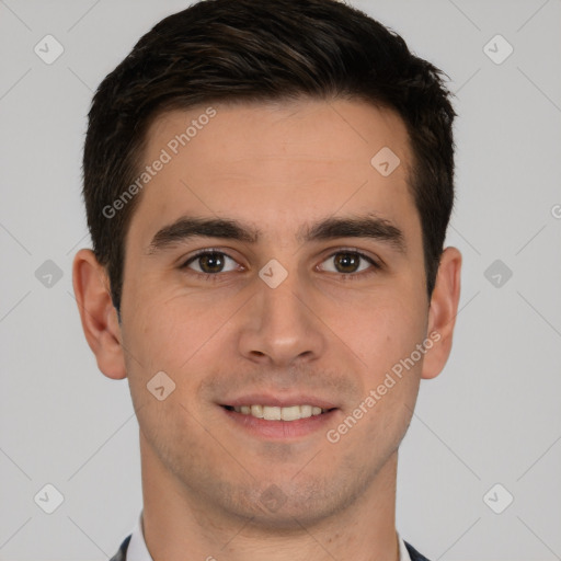 Joyful white young-adult male with short  brown hair and brown eyes