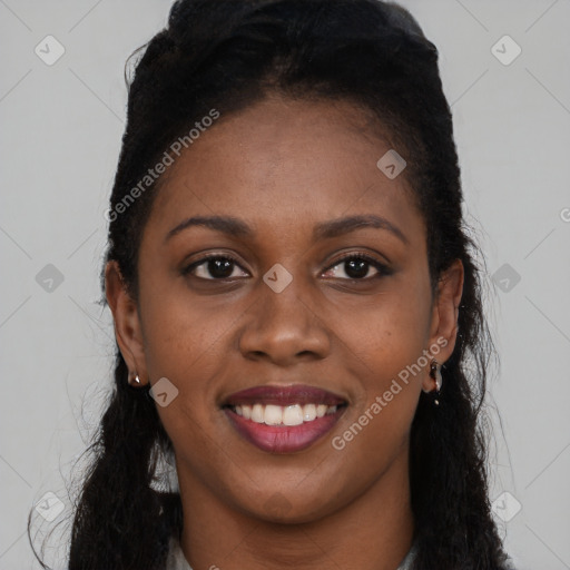 Joyful black young-adult female with long  brown hair and brown eyes