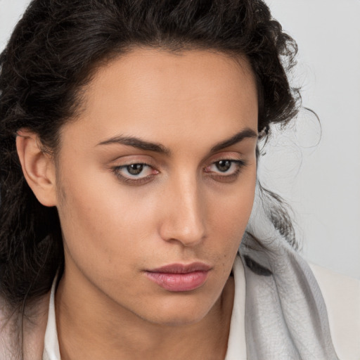 Neutral white young-adult female with medium  brown hair and brown eyes