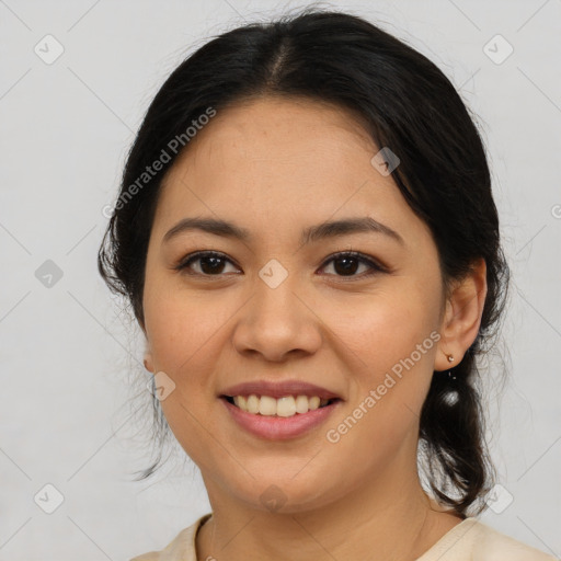 Joyful asian young-adult female with medium  brown hair and brown eyes