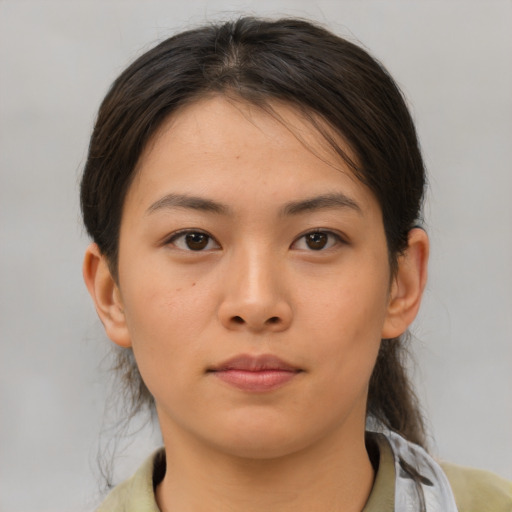 Neutral asian young-adult female with medium  brown hair and brown eyes