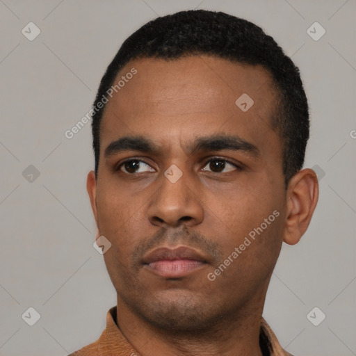 Neutral latino young-adult male with short  black hair and brown eyes
