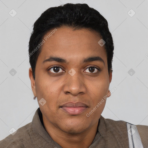 Joyful black young-adult male with short  black hair and brown eyes