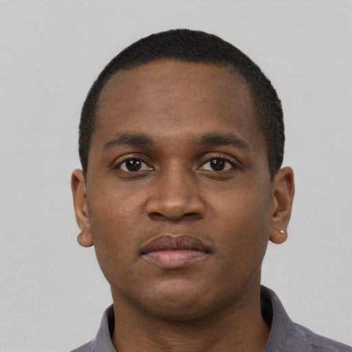 Neutral black young-adult male with short  brown hair and brown eyes