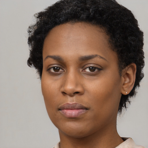 Neutral black young-adult female with short  black hair and brown eyes
