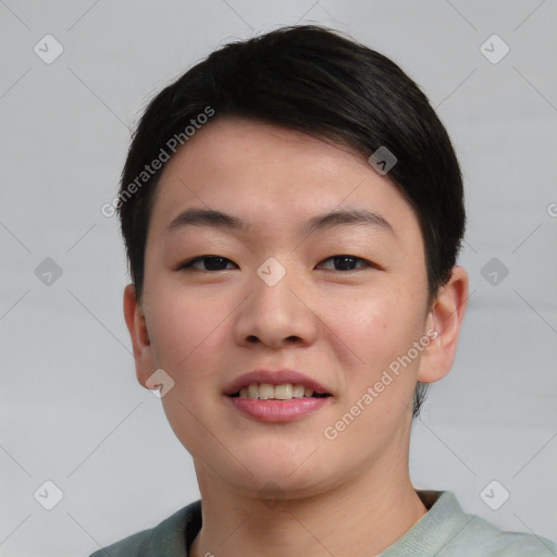 Joyful asian young-adult female with short  black hair and brown eyes