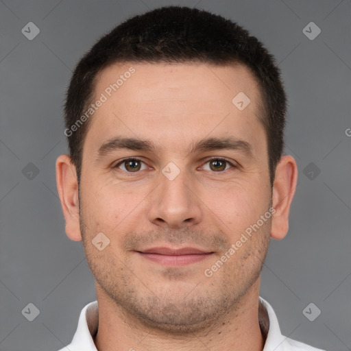 Joyful white adult male with short  brown hair and brown eyes