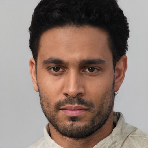 Neutral black young-adult male with short  black hair and brown eyes