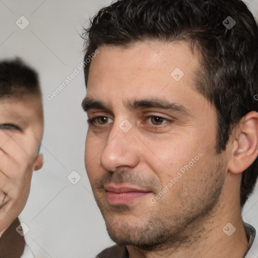 Neutral white adult male with short  brown hair and brown eyes