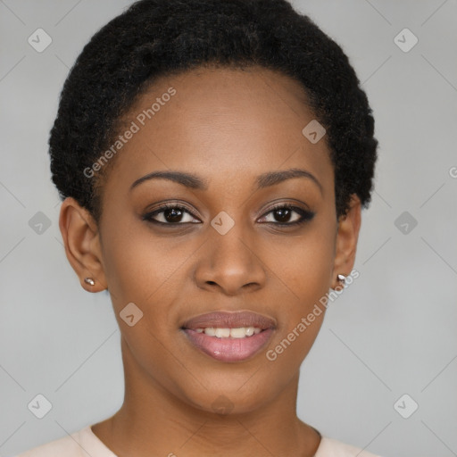 Joyful black young-adult female with short  brown hair and brown eyes