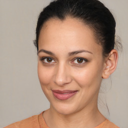 Joyful white young-adult female with medium  brown hair and brown eyes