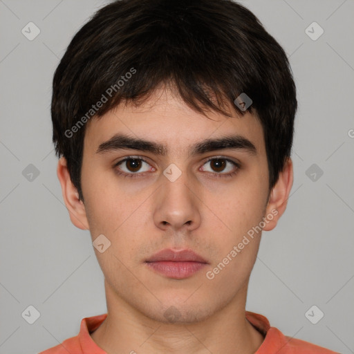 Neutral white young-adult male with short  brown hair and brown eyes