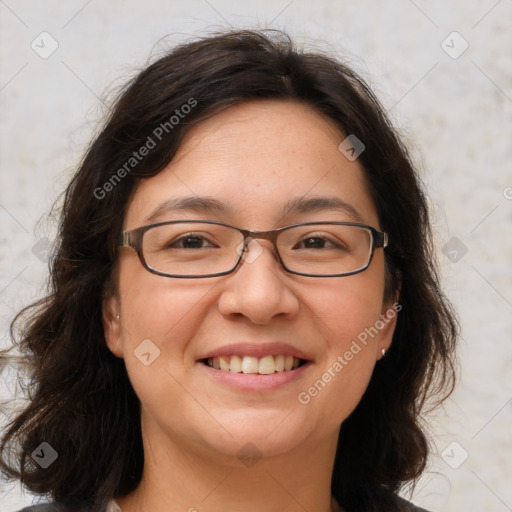 Joyful white adult female with medium  brown hair and brown eyes