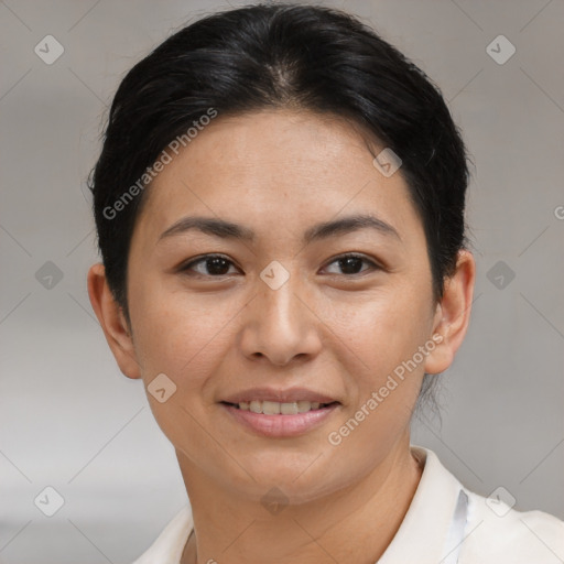 Joyful asian young-adult female with short  brown hair and brown eyes