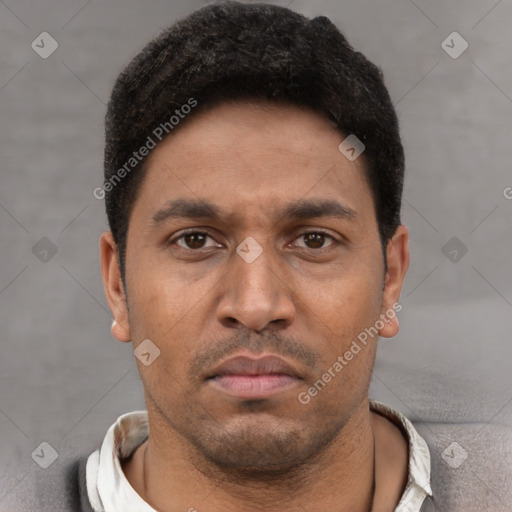 Neutral white young-adult male with short  black hair and brown eyes