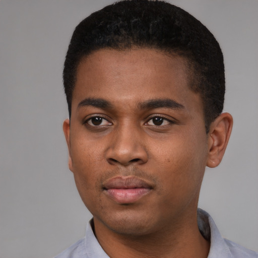 Neutral black young-adult male with short  black hair and brown eyes