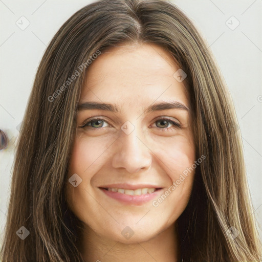 Joyful white young-adult female with long  brown hair and green eyes