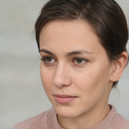 Neutral white young-adult female with short  brown hair and brown eyes