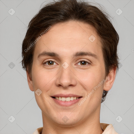 Joyful white young-adult female with short  brown hair and brown eyes