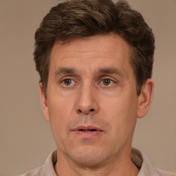 Neutral white adult male with short  brown hair and brown eyes