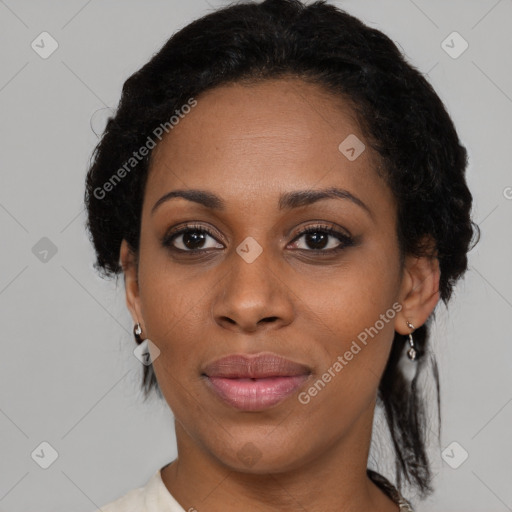 Joyful black young-adult female with medium  black hair and brown eyes