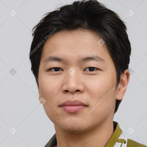 Neutral asian young-adult male with short  brown hair and brown eyes
