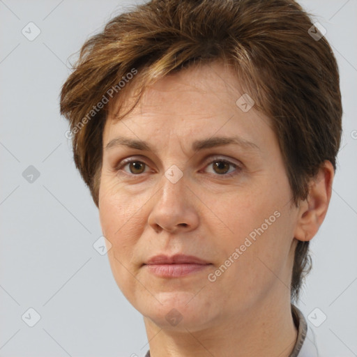 Joyful white adult female with short  brown hair and brown eyes