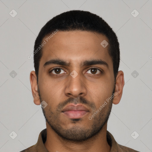 Neutral latino young-adult male with short  black hair and brown eyes