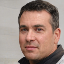 Neutral white adult male with short  brown hair and brown eyes