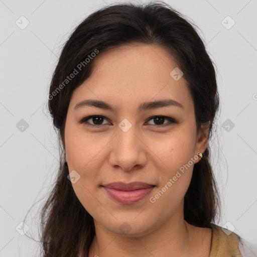 Joyful asian young-adult female with long  brown hair and brown eyes