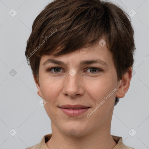 Joyful white young-adult female with short  brown hair and grey eyes