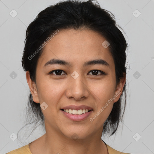 Joyful asian young-adult female with medium  black hair and brown eyes