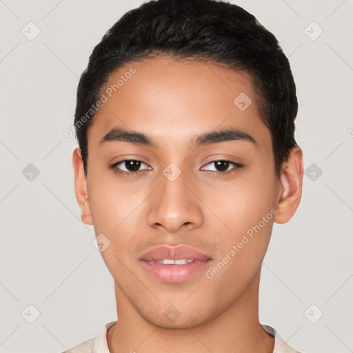 Joyful latino young-adult male with short  black hair and brown eyes