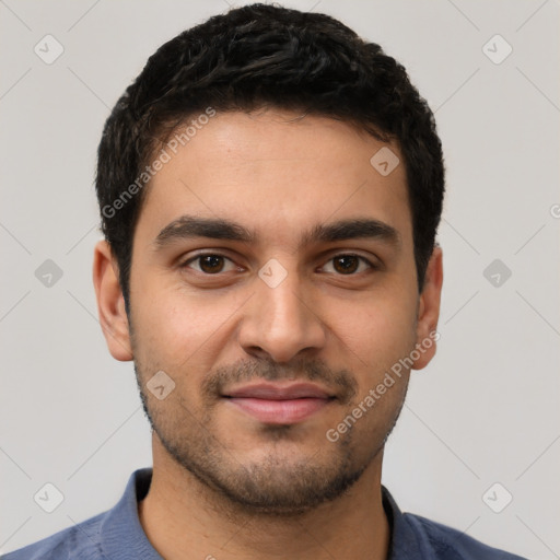 Joyful latino young-adult male with short  black hair and brown eyes