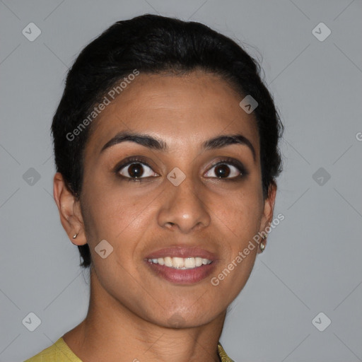 Joyful latino young-adult female with short  brown hair and brown eyes