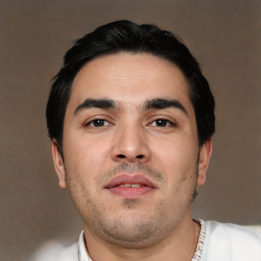 Neutral white young-adult male with short  black hair and brown eyes