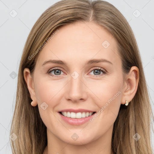 Joyful white young-adult female with long  brown hair and grey eyes