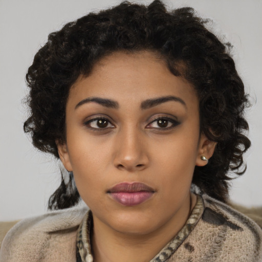 Neutral latino young-adult female with short  brown hair and brown eyes