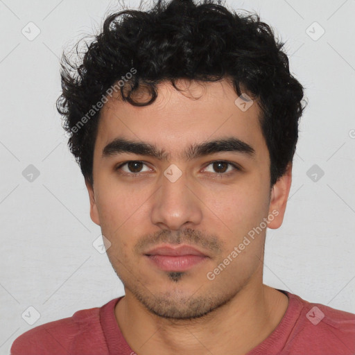 Neutral white young-adult male with short  black hair and brown eyes