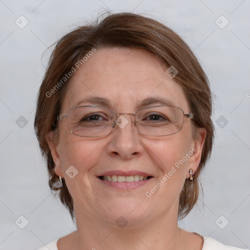 Joyful white adult female with medium  brown hair and blue eyes