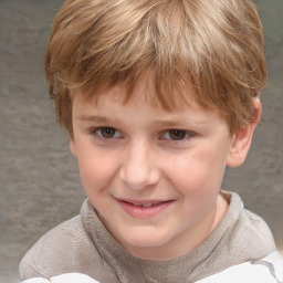 Joyful white child male with short  brown hair and brown eyes