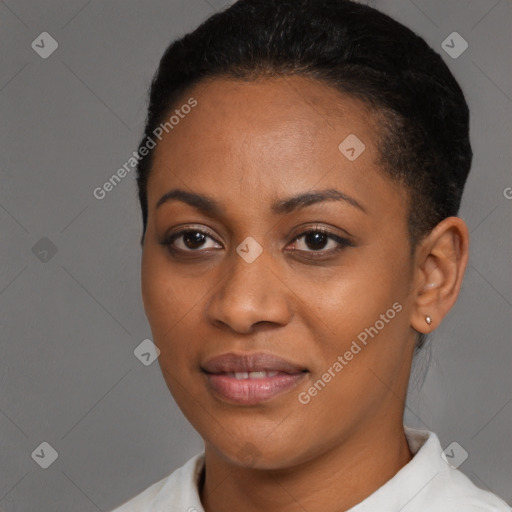 Joyful black young-adult female with short  black hair and brown eyes